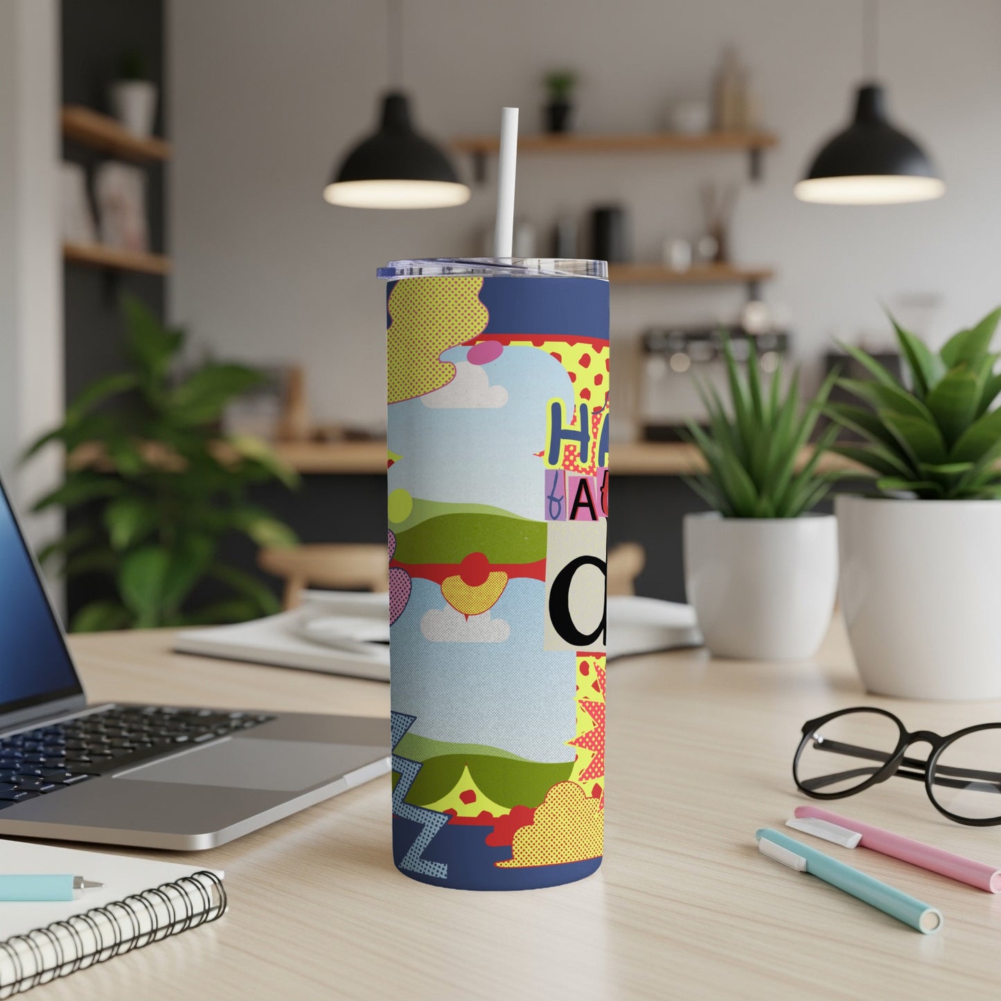 Colorful tumbler with abstract pop art design and text "HAPPY"