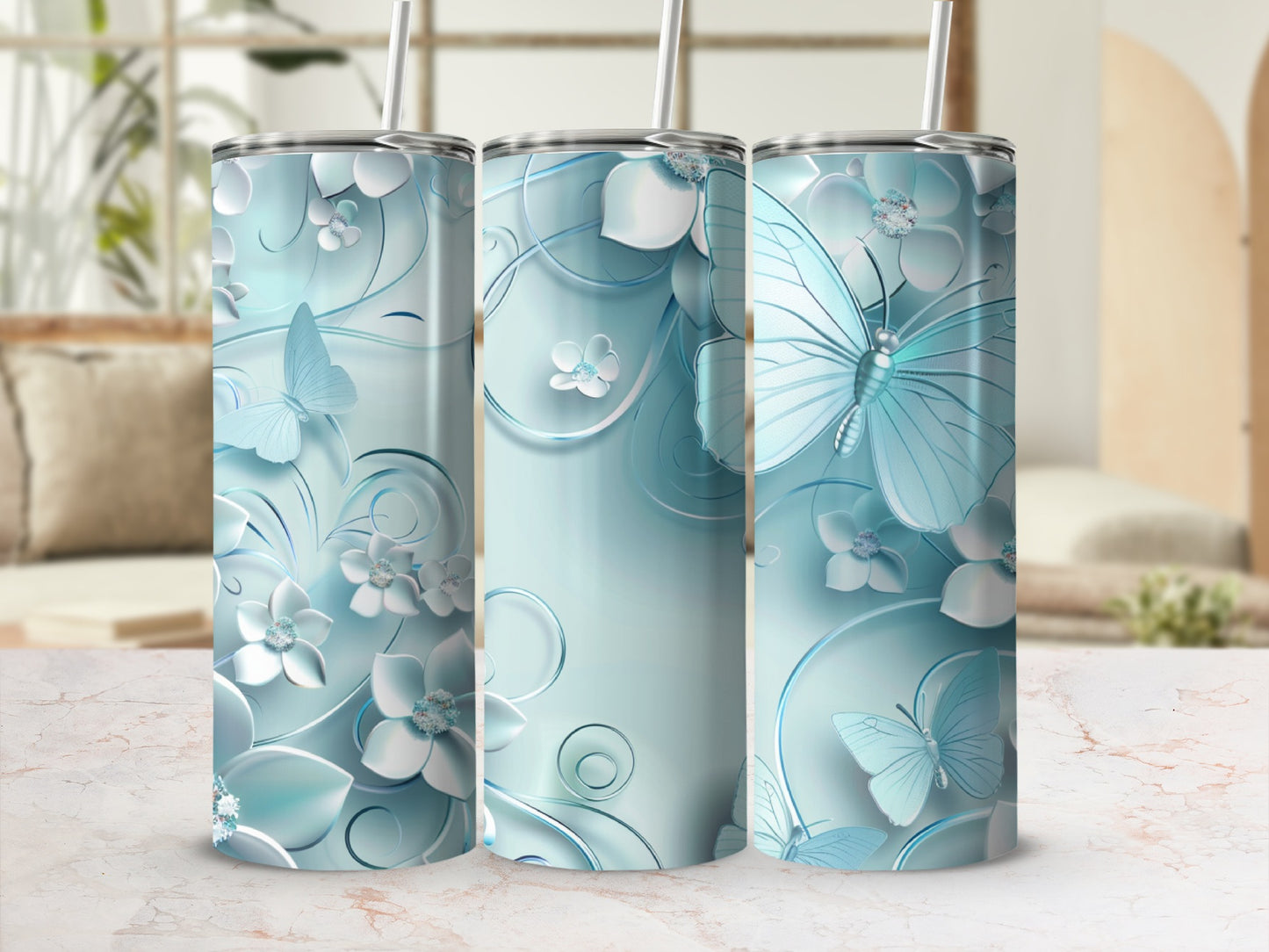 Light blue tumbler with butterflies and floral swirls.