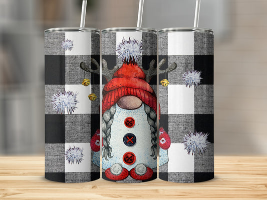 Three tumblers with a gnome design on a black and white buffalo plaid background.