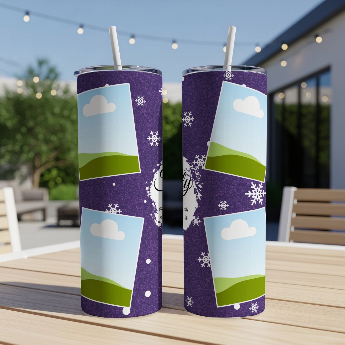Two purple tumblers with a snowflake and photo collage design featuring sky and hills.