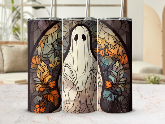 Ghost in stained glass design on a tumbler with straw.