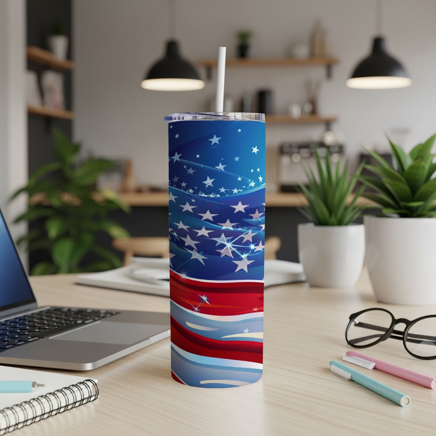 Red, white, and blue stars and stripes American flag tumbler with straw.