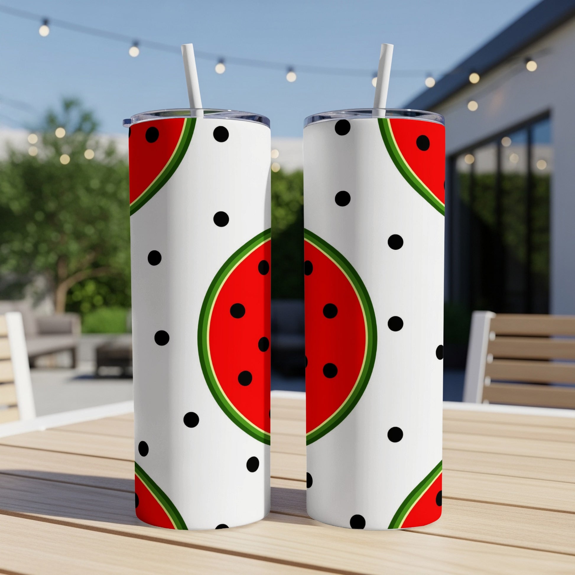 Two white tumblers with watermelon and polka dot design.