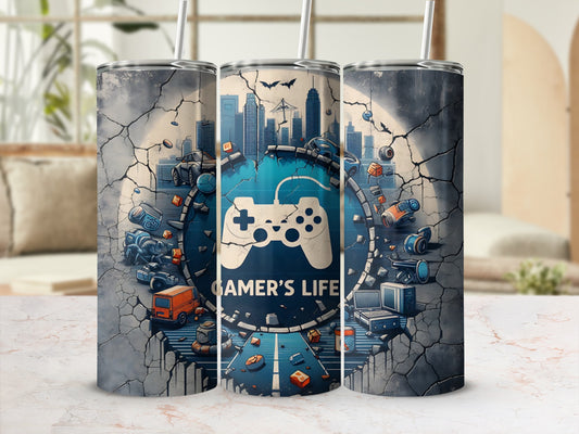 Gamer's Life tumbler with cityscape, controller, and gaming icons on cracked concrete background.