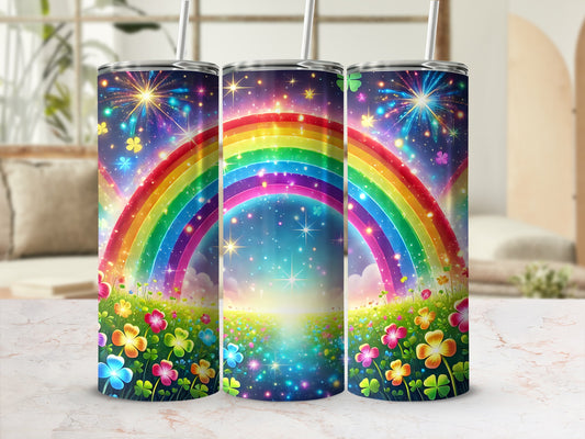 Three tumblers featuring a rainbow, fireworks, and clover designs.