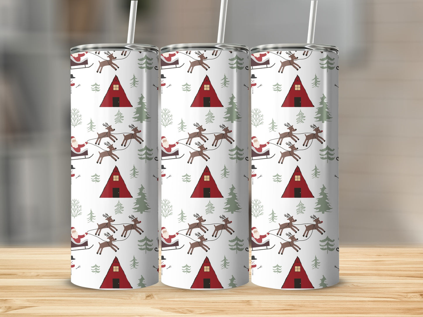 Three tumblers with a Christmas pattern of Santa, reindeer, trees, and a red barn.