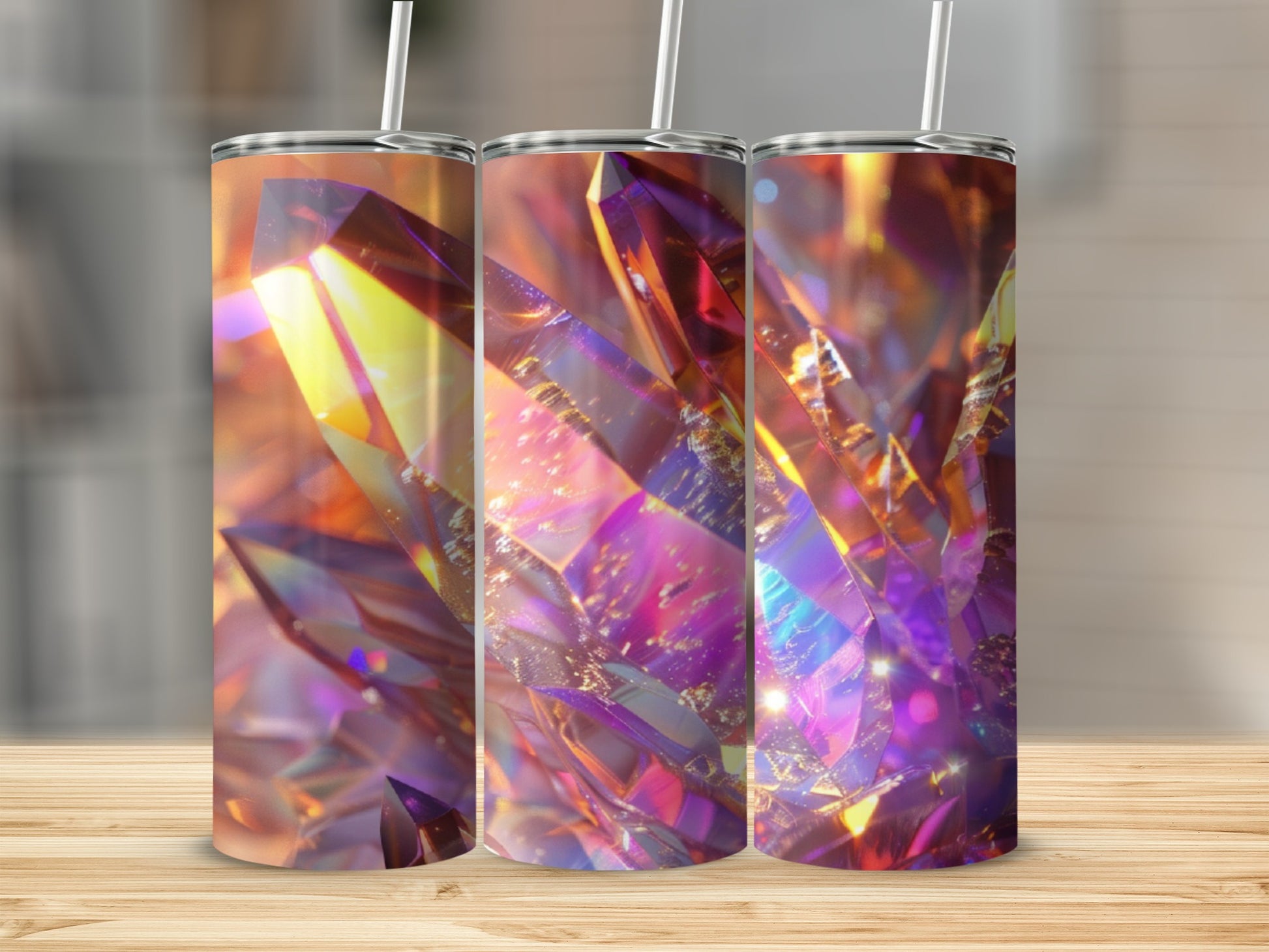Triptych of tumblers with vibrant, iridescent crystal designs.