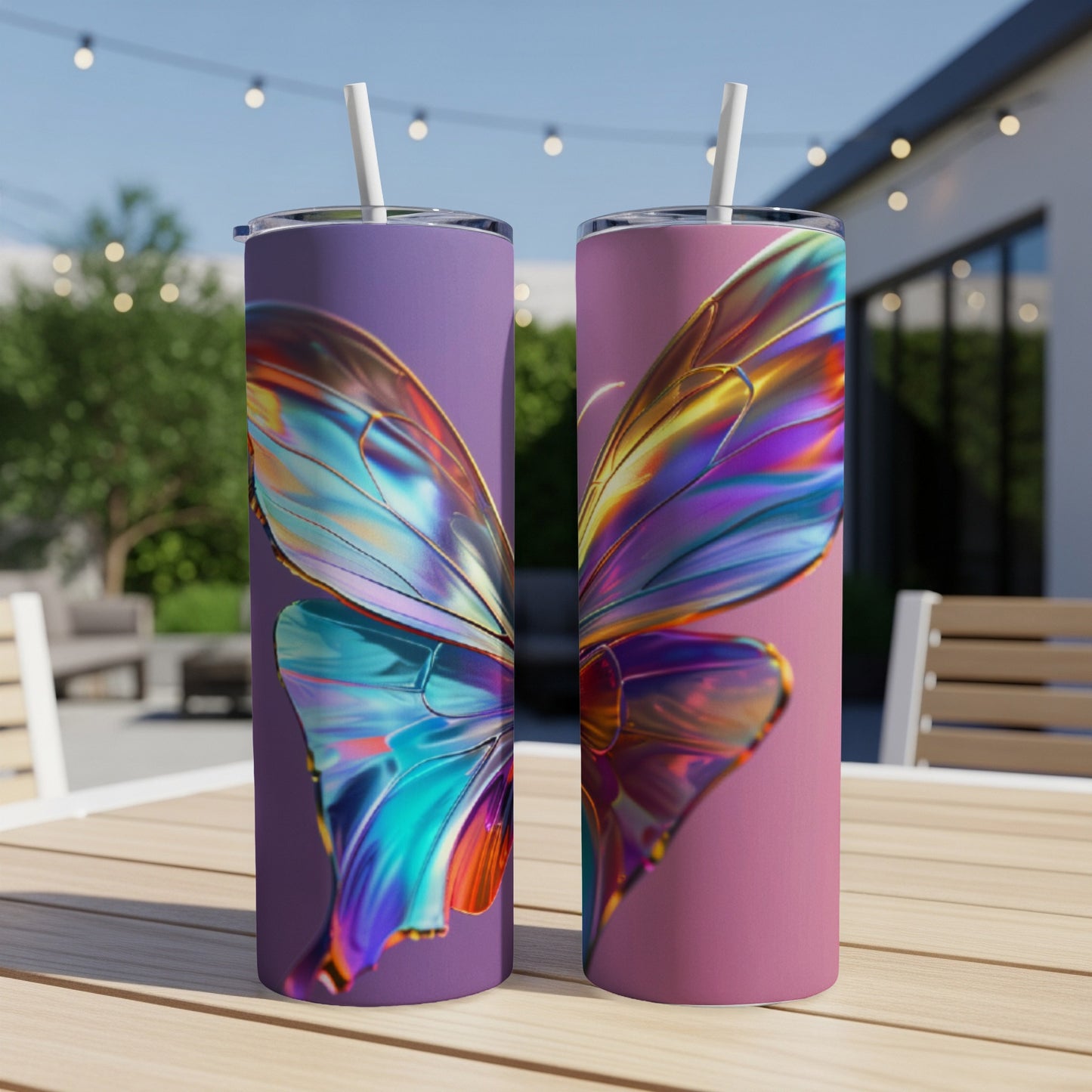 Two iridescent butterfly wing tumblers on a wooden table.