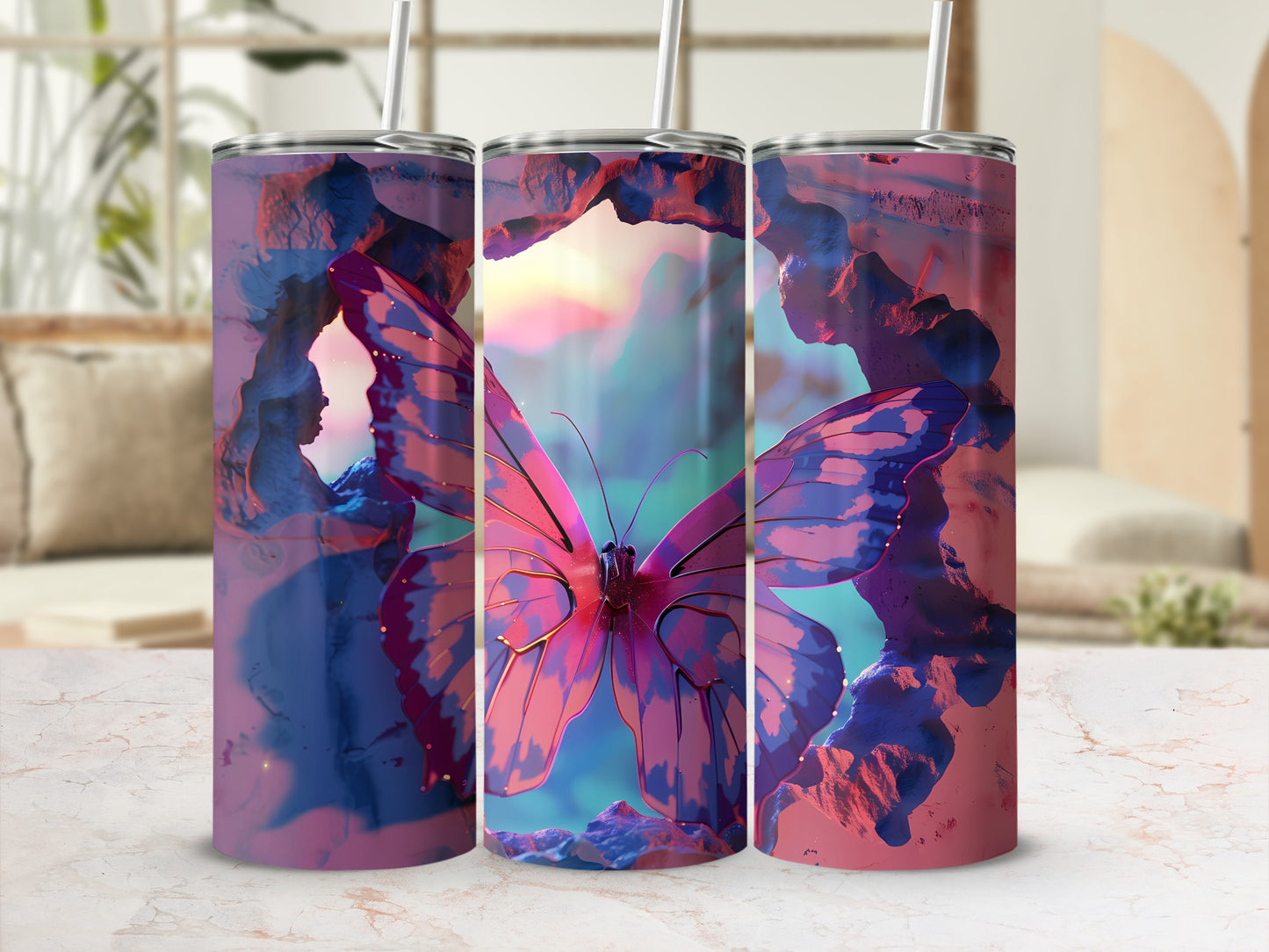 Three tumblers featuring a pink and purple butterfly in a rocky landscape.