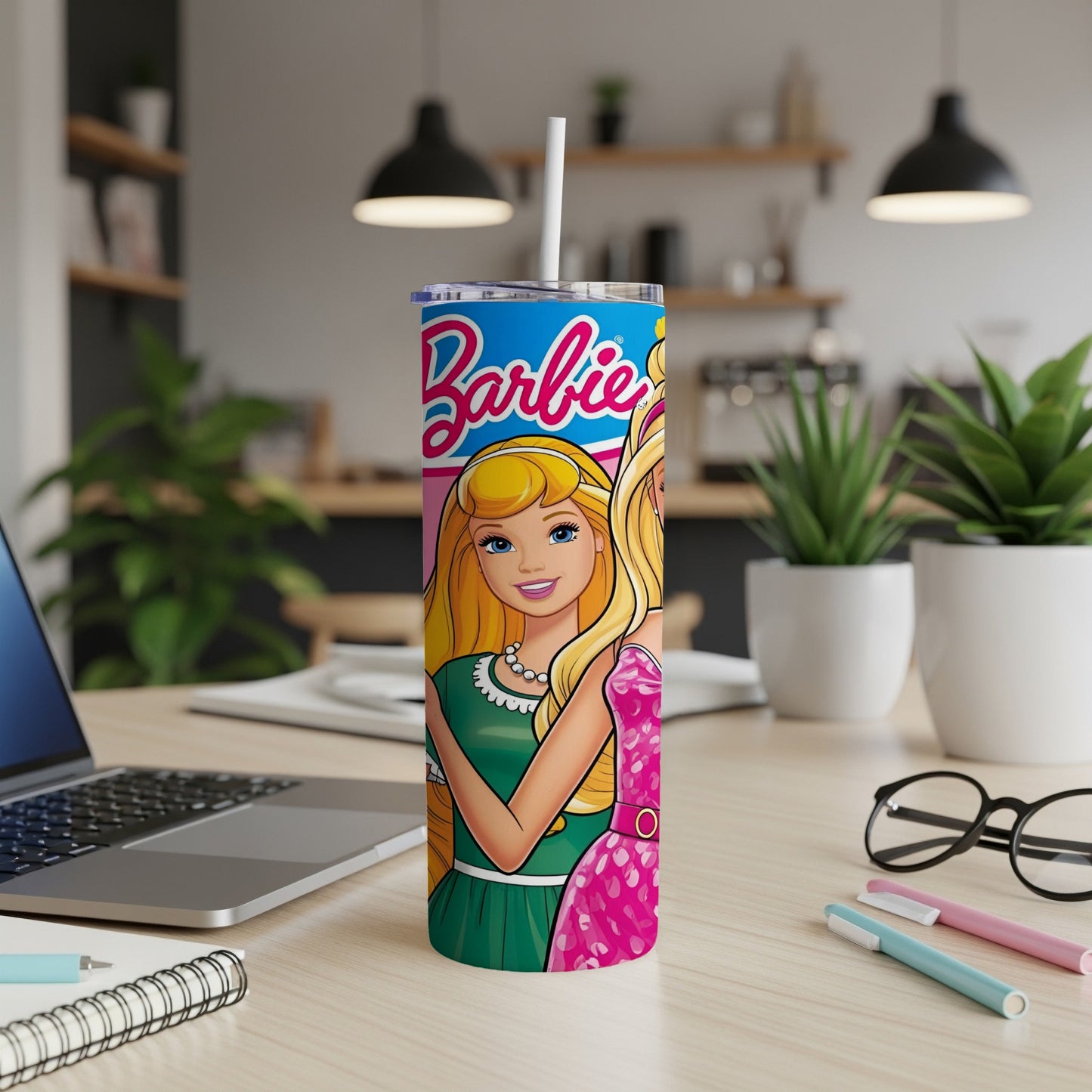 Barbie tumbler with Barbie and Ken illustrations and text.
