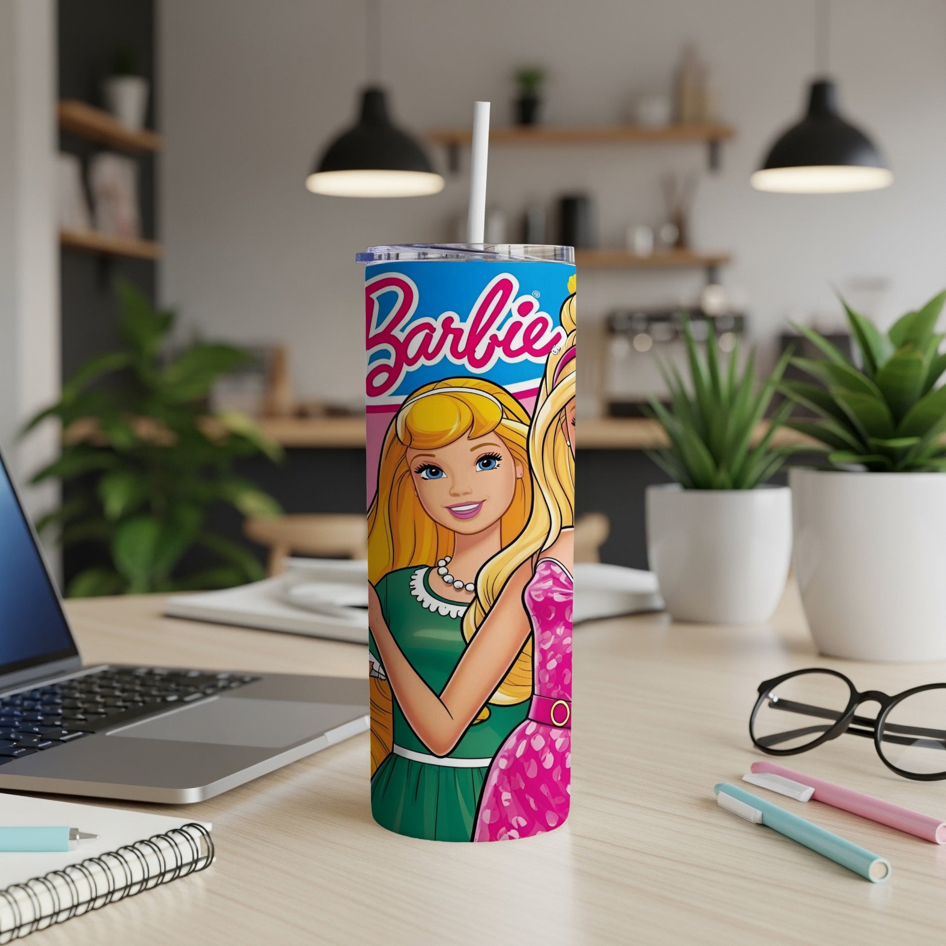 Barbie tumbler with Barbie and Ken illustrations and text.