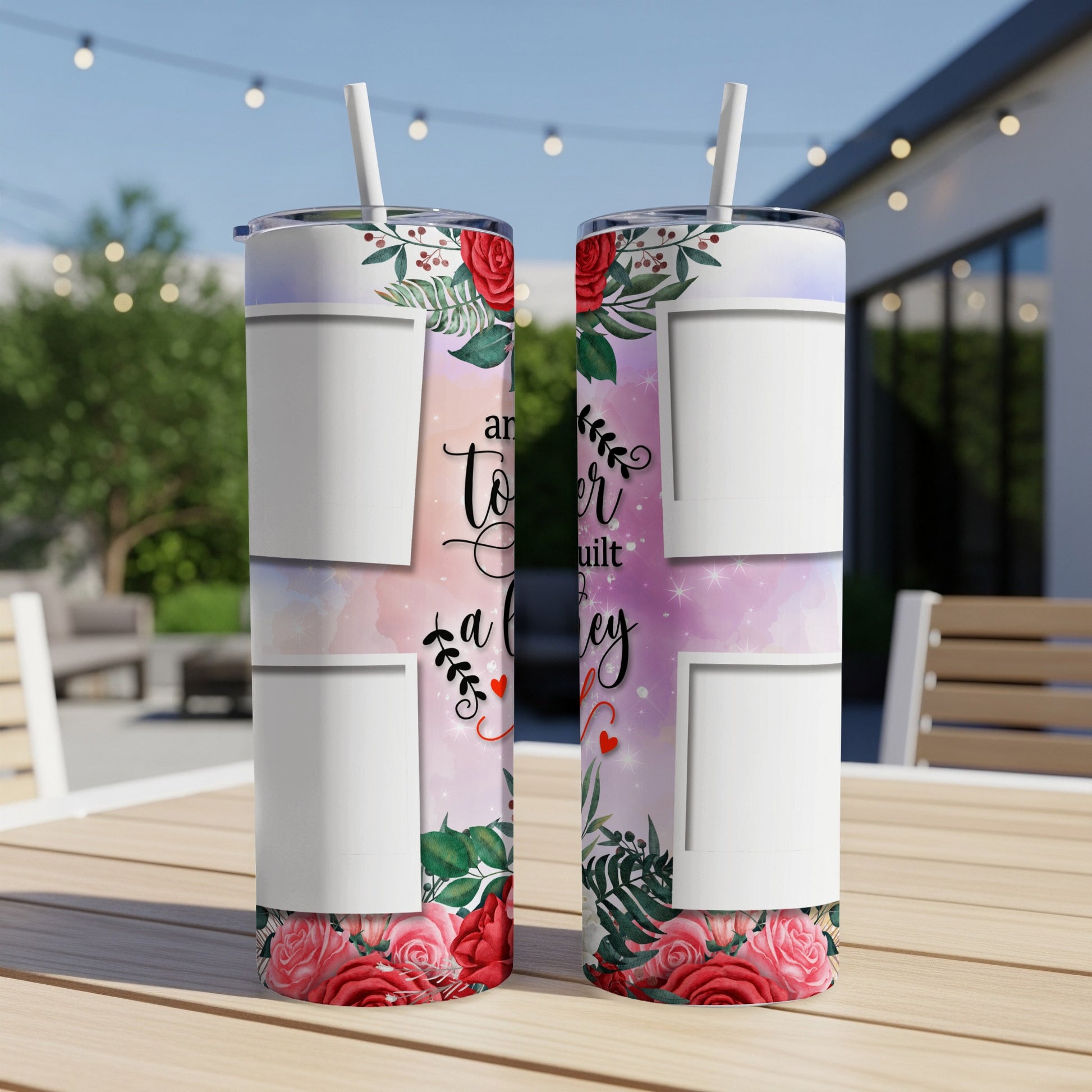 Two tumblers with floral design and "love" text, displayed outdoors on a table.