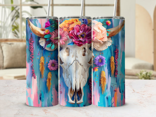 Floral bull skull on a colorful abstract painted background.