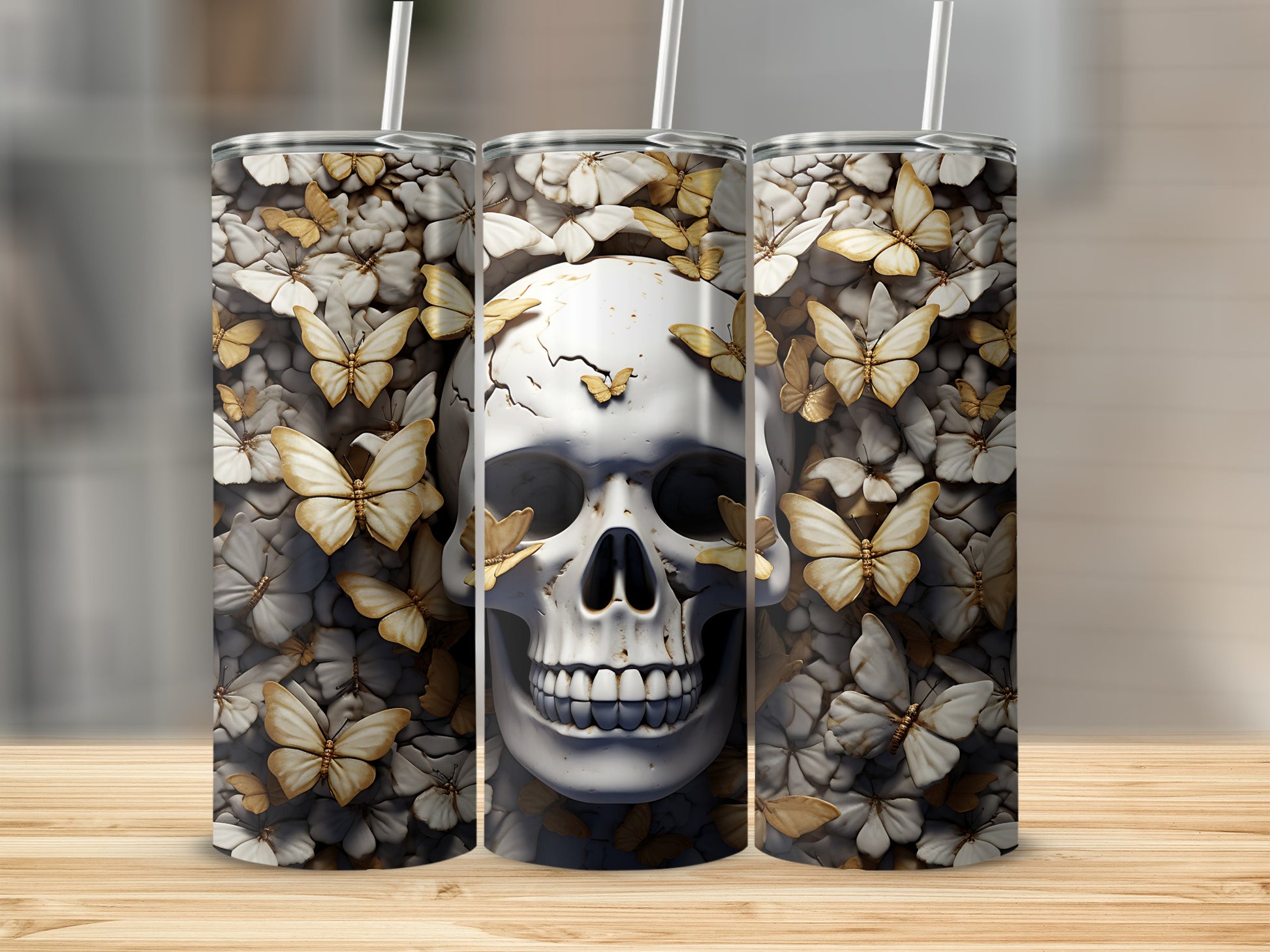 Skull and golden butterflies tumbler on a wooden surface.