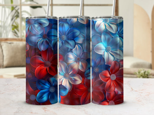 Three tumblers featuring red and blue floral patterns with straws.