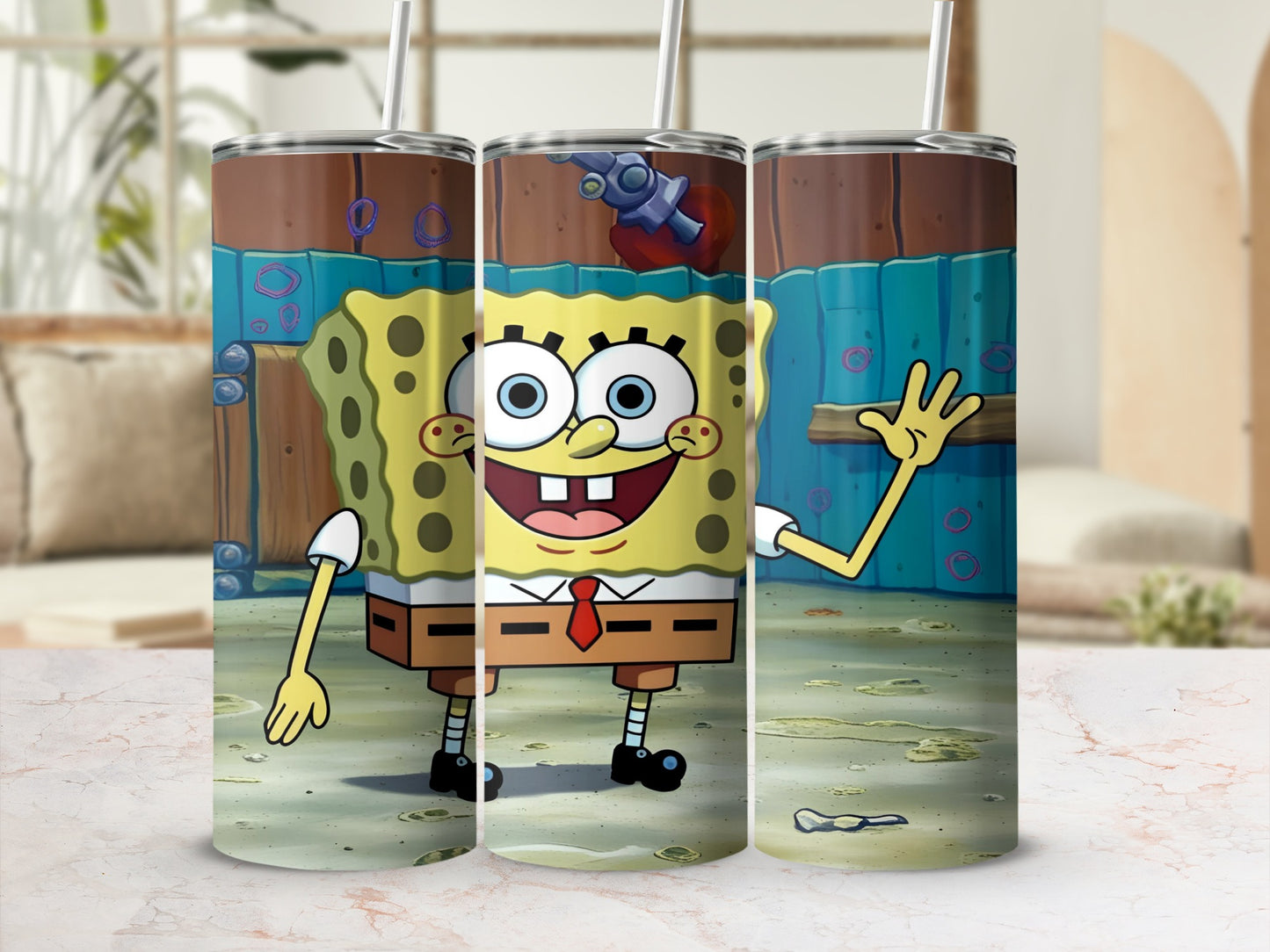 SpongeBob SquarePants character on a stainless steel tumbler with a straw.
